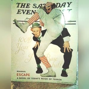 Vintage Normal Rockwell Tin wall art.